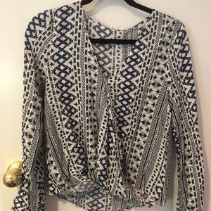 Printed surplice front long sleeve top